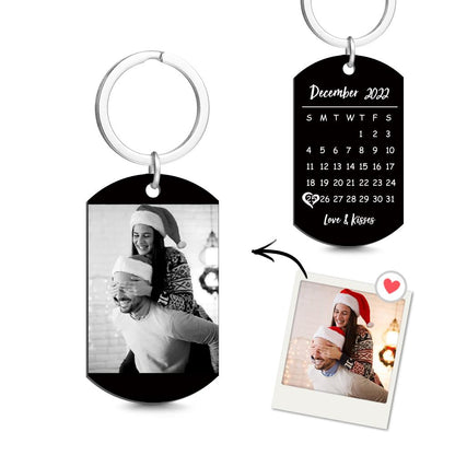 Close-up of personalised stainless steel keyring tag showing crisp photo print and engraved calendar detail for a memorable keepsake