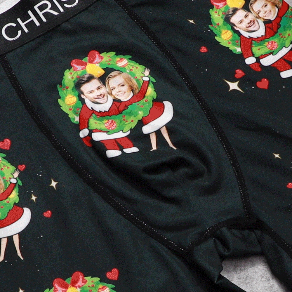 Animated view of custom photo boxers on a model — funny personalised Christmas couple gift featuring double Santa print