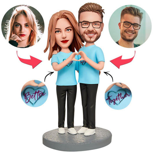 Personalised blue couple bobblehead, handmade polymer clay figurine of a couple in matching blue outfits with space for engraved text ‘Forever Together’ — custom head likeness ideal for anniversary or wedding keepsake