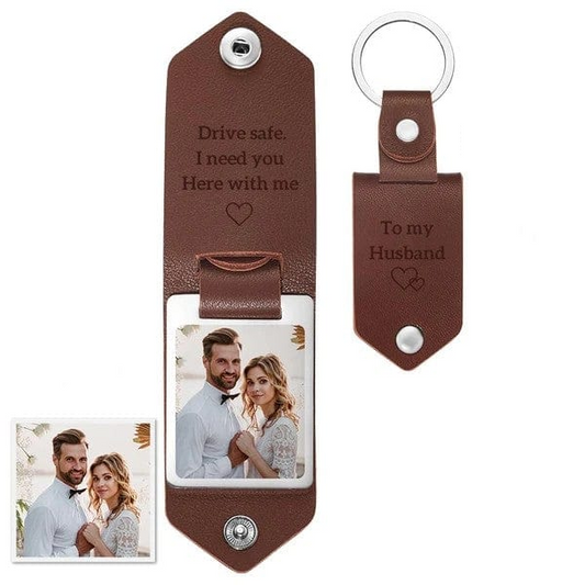Personalised leather photo keyring showing a printed couple photo with custom engraved text on a genuine leather tag and metal ring – ideal anniversary gift for couples