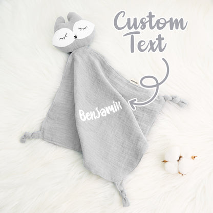 Pastel embroidered name on a soft cotton baby comfort towel — a delicate, gender-neutral personalised newborn gift