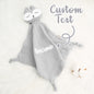 Pastel embroidered name on a soft cotton baby comfort towel — a delicate, gender-neutral personalised newborn gift