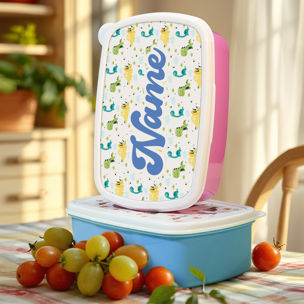 Close up of cute dinosaur design and personalised name on lunch box — detailed view of a personalised lunchbox for boys and girls