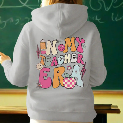 Personalised teacher sweatshirt presented with gift tag — meaningful custom name gift for teacher appreciation and graduations