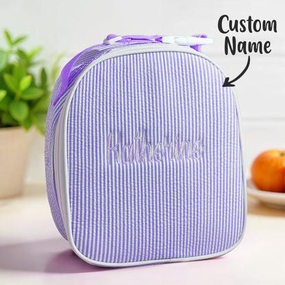 Interior view of personalised seersucker lunch bag showing roomy compartment that fits standard lunch containers and snacks