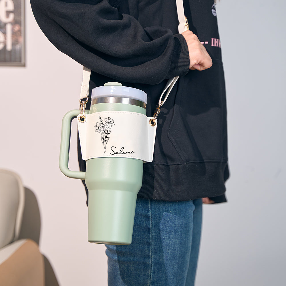 Adjustable strap detail and metal buckle on personalised 40oz Stanley tumbler carrier bag for comfortable crossbody wear