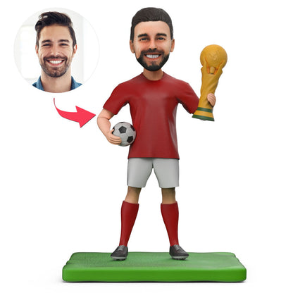 Front view personalised World Cup football bobblehead in football kit with engraved name on plinth — custom engraved bobblehead gift for football fans