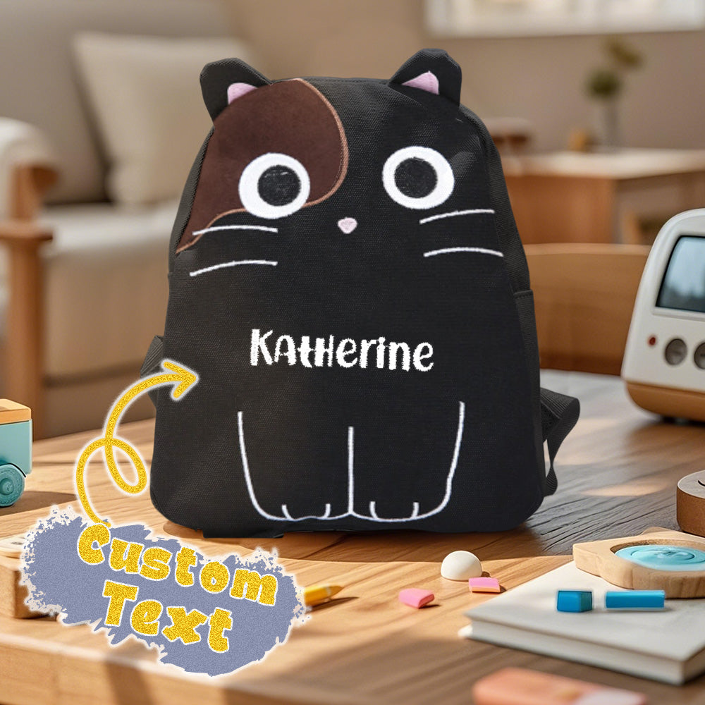Front view of personalised name embroidery cat backpack for kids — canvas custom school bag with cute cat motif and secure zip