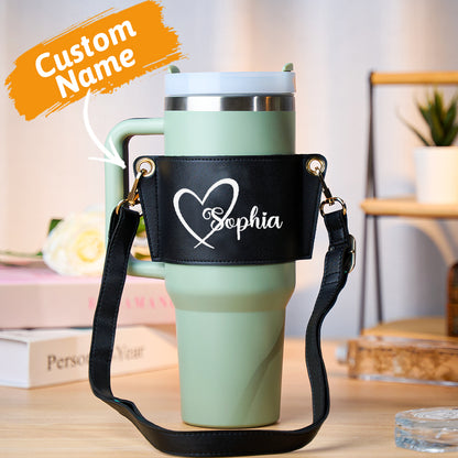 Adjustable strap detail of personalised PU leather carrier for 40oz Stanley tumbler — 64.7–118 cm (25.47–46.4 in) for shoulder or crossbody wear