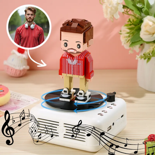 Customisable one-person full-body personalised brick figure seated on Bluetooth speaker base, front view — bespoke anniversary gift and custom brick figure speaker