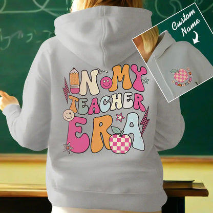 Teacher wearing personalised 'In My Teacher Era' hoodie in classroom setting — thoughtful personalised gift for mentors and staff