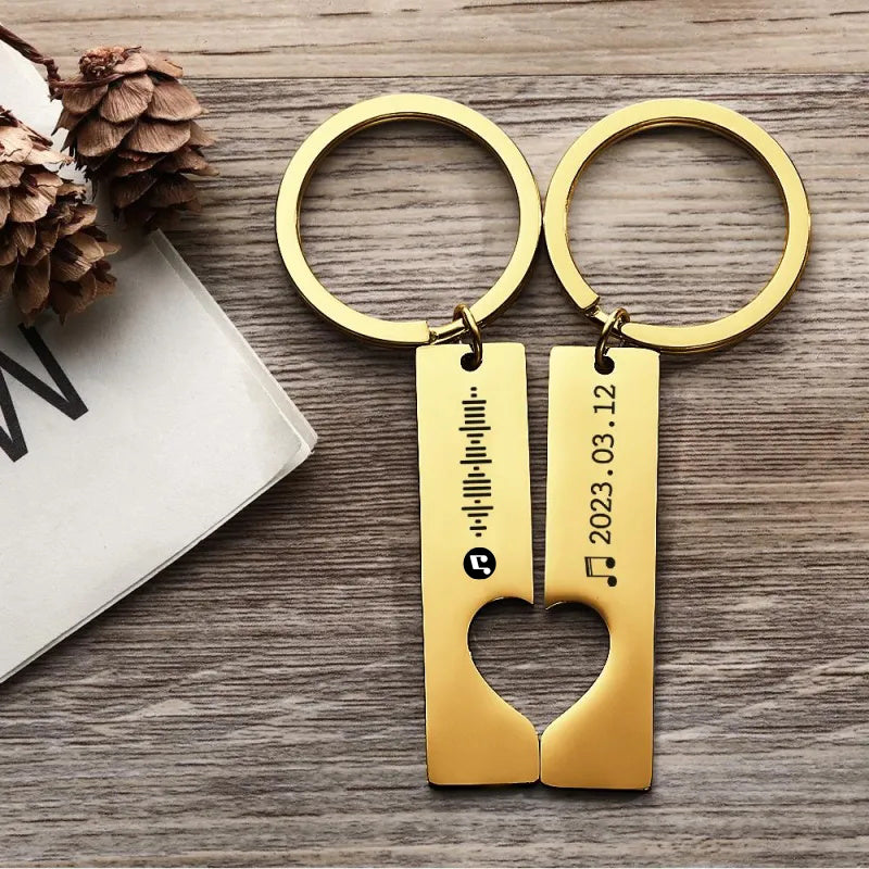 Group view of different personalised keychain designs featuring heart cut‑out and Spotify code engraving – ideal gifts for teens and sisters