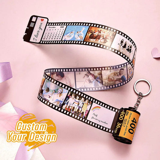 Personalised camera-roll keyring displaying a row of custom photos with personalised date and text – retro photo keychain gift