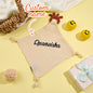 Baby cuddling a Personalised Soothe Towel comforter with embroidered name for soothing sleep and added security