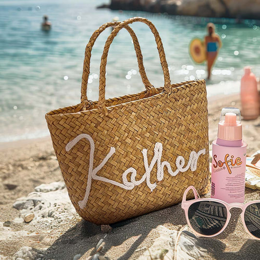 Personalised handmade bohemian straw bucket bag front view with custom name ideal for beach and travel