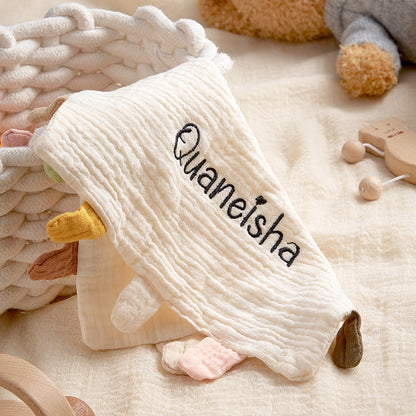 Close-up of embroidered name on soft cotton lovey – premium stitching detail on personalised baby comfort towel