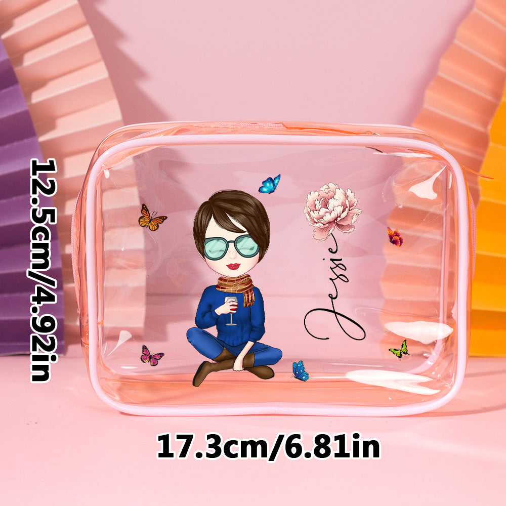 Close-up of personalised birth flower and name on transparent PVC make-up bag — bespoke bridesmaid or Mother’s Day gift