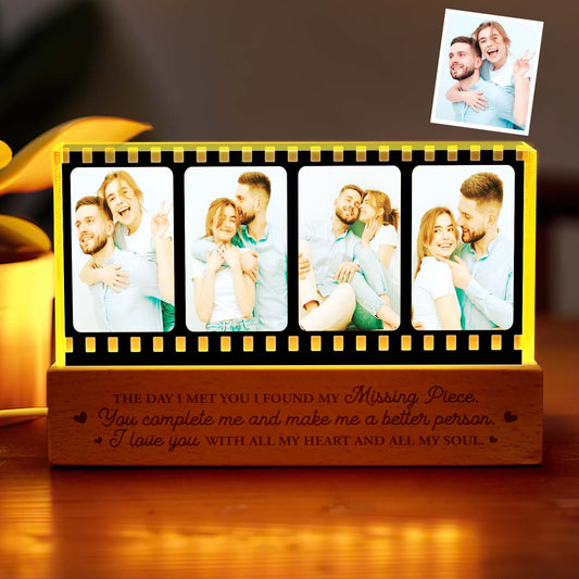 Personalised Photo Night Light in film-style design, crystal-clear acrylic lamp displaying a favourite photo on a bedside table.