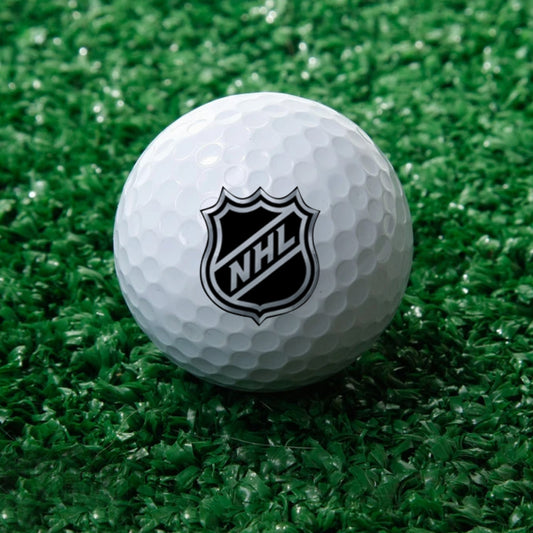 Close-up of personalised custom logo golf balls with crisp UV printing on durable rubber — white personalised golf balls ideal as printed golf gifts for golfers