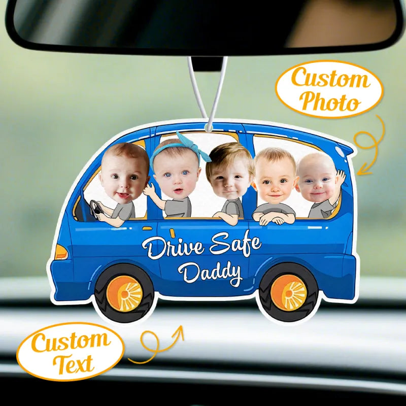 Alternative angle showing air freshener hanging from rear-view mirror.