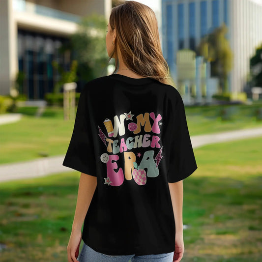 Front view of personalised 'In My Teacher Era' T‑Shirt with custom name – black polyester teacher tee, ideal back-to-school gift