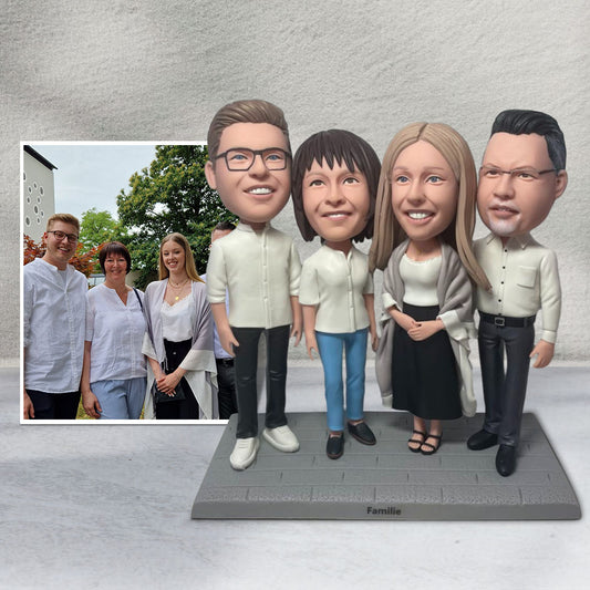 Four-person custom bobblehead set – personalised family keepsake gift handcrafted from premium polymer clay with lifelike hand-sculpted faces and customised poses