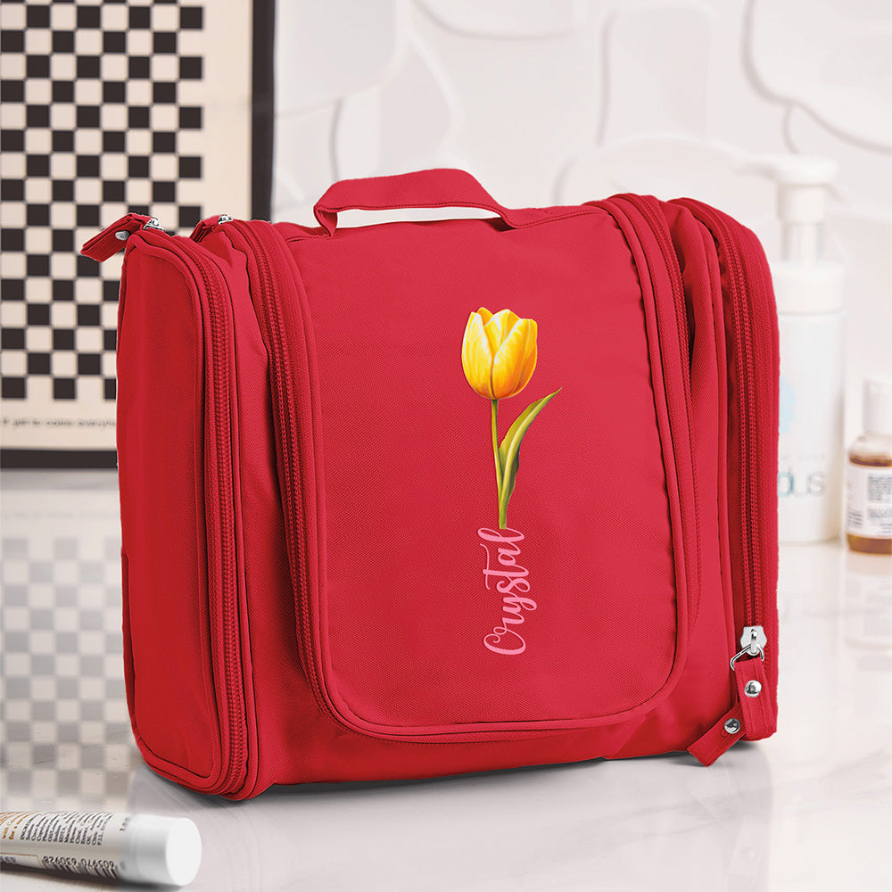 Angled view of personalised birth flower makeup organiser highlighting durable stitching, zip detail and organiser pockets — perfect gift for her