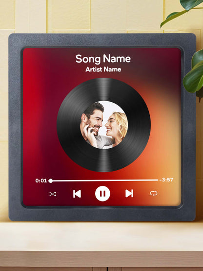Personalised photo vinyl record fridge magnet displayed on a fridge among kitchen magnets a bespoke music keepsake for weddings and anniversaries