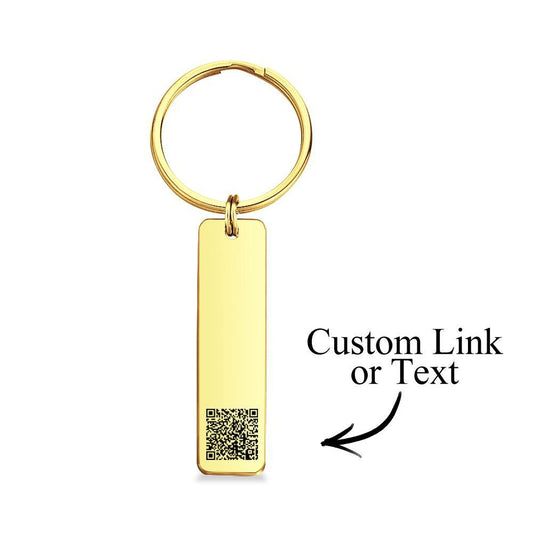 Personalised engraved QR code keychain close-up, laser-engraved scannable code on a mirror-polished stainless steel custom keyring, ideal personalised gift