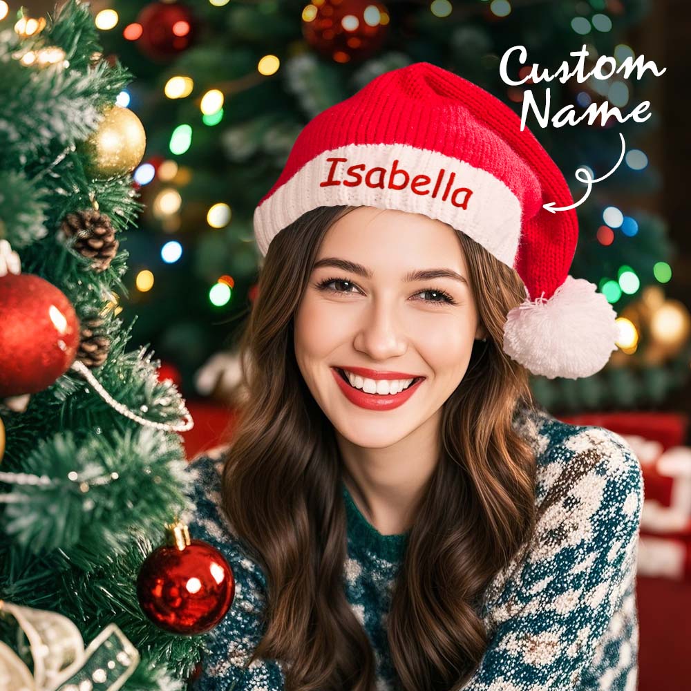 Personalised embroidered Santa hat with custom name on a classic red and white Christmas hat — perfect personalised name gift for family photos