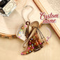 Angle showing the hanging loop and secure design for the rearview mirror charm.