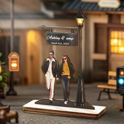 Illuminated wooden photo light display casting a warm glow, ideal for romantic settings and memories.