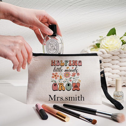 Personalised floral canvas pouch displayed flat to show full design and custom name placement