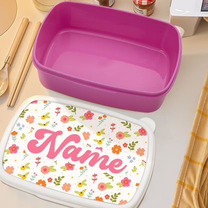 Close-up of colourful flower design and personalised name on kids lunch box – high-quality printed custom name gift