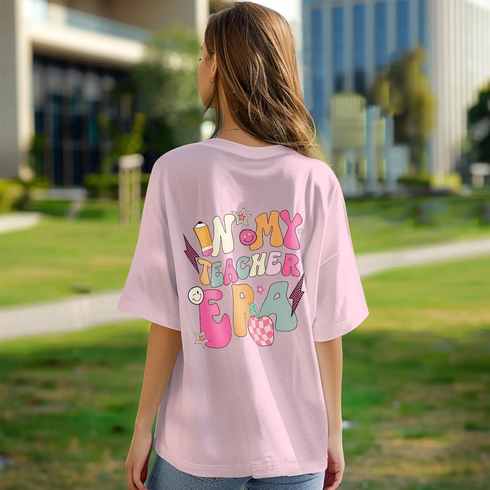 Close-up of hem and care label on personalised polyester teacher T‑Shirt – machine washable with long-lasting print