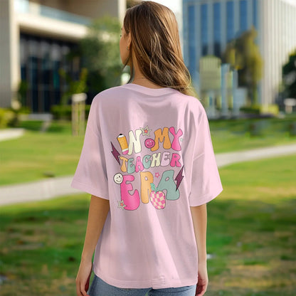 Close-up of hem and care label on personalised polyester teacher T‑Shirt – machine washable with long-lasting print