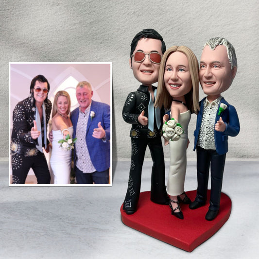Front view of three personalised 3-person custom bobbleheads handcrafted from oven-baked polymer clay — bespoke photo gift for couples and families, ideal as an anniversary or wedding keepsake