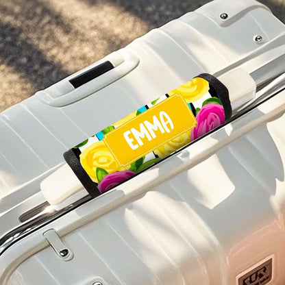 Neoprene luggage handle wrap fitted on a cabin suitcase handle — personalised travel gift to identify luggage instantly
