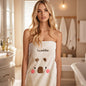 Folded personalised coral fleece towel presented as a luxury gift for wife or woman, elegant and ready to give