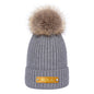 Personalised baby beanie folded to show interior stretch and secure construction — safe newborn winter hat design