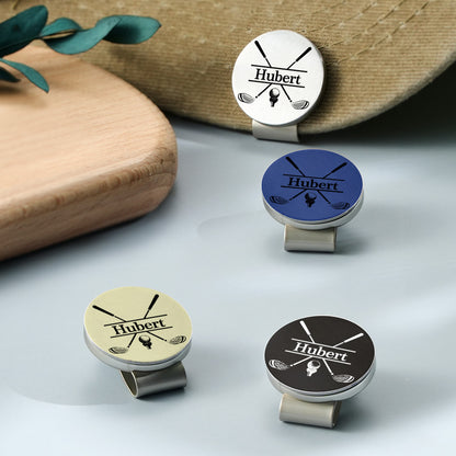 Personalised golf ball marker beside a golf ball to demonstrate scale, 0.98in polished metal marker – thoughtful golfer gift