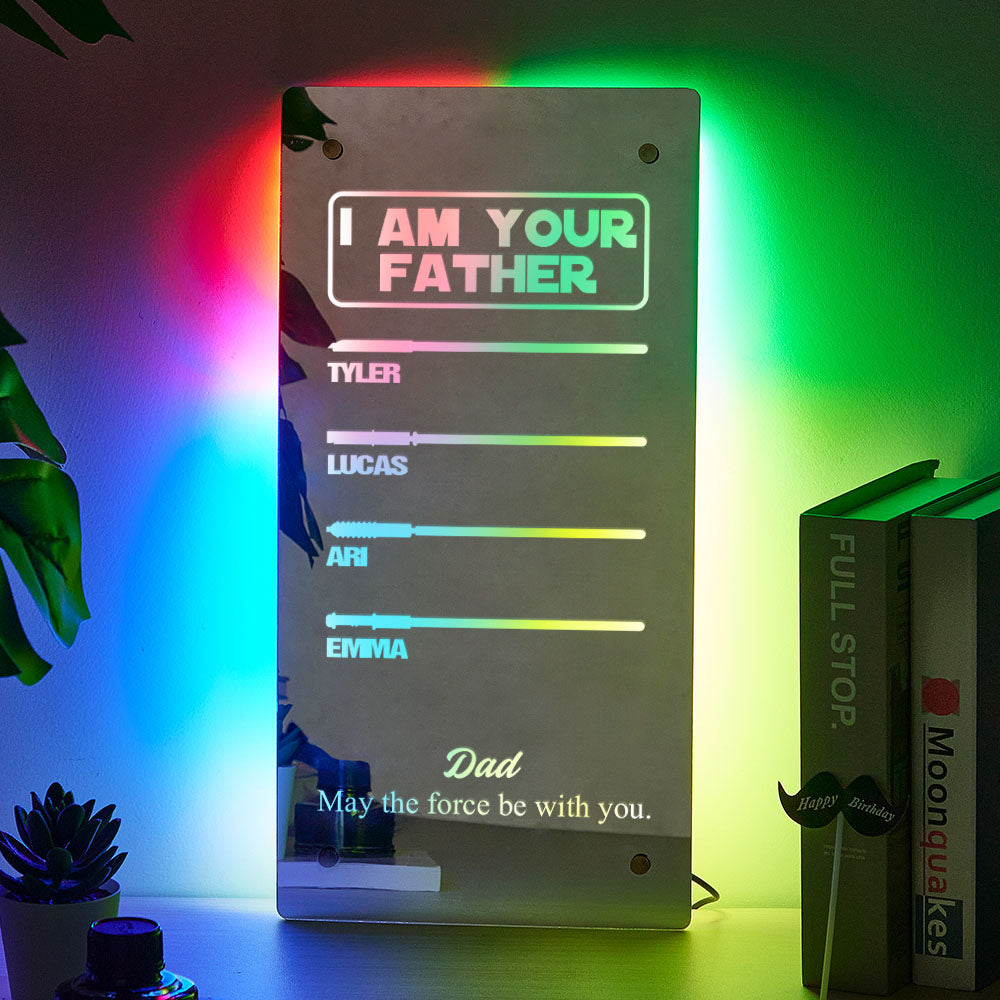 Lifestyle image of lightsaber mirror lamp on a bedside table with soft LED glow, personalised with children's names — thoughtful gift for him
