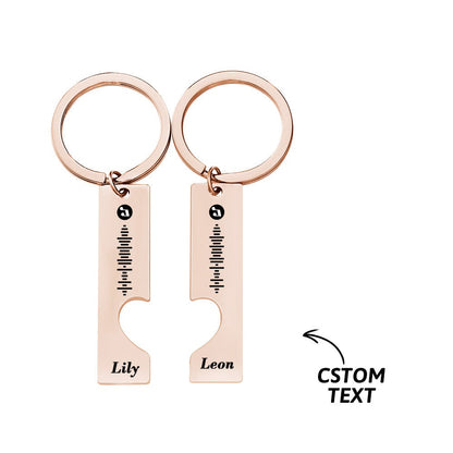 Close‑up showing 3D engraved Spotify scan code on a stainless steel keychain being scanned on a phone – personalised music keyring demo