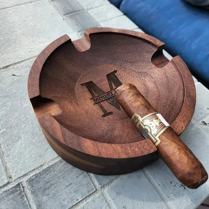 Detail of personalised engraving and smooth sealed finish on walnut ashtray – custom name or monogram on wooden cigar rest