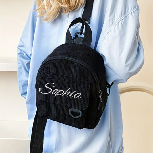Front view of personalised mini corduroy backpack with embroidered name — compact kids' school bag for preschool