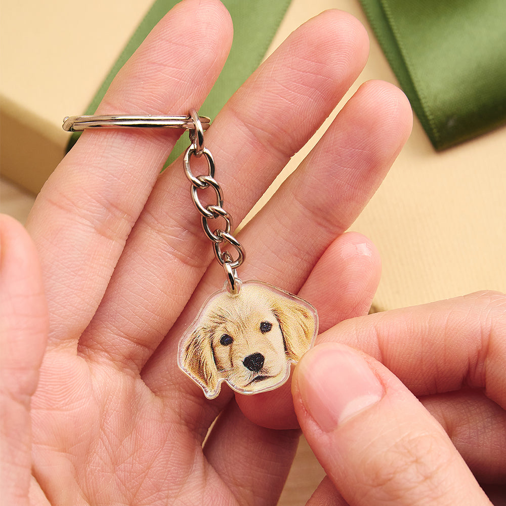 Handheld view of a personalised acrylic keyring with high-quality printed pet portrait — compact keepsake for pet owners in the UK and Australia