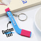 Personalised hockey coach stick keyring with clear custom name — compact stocking filler and party favour for hockey fans