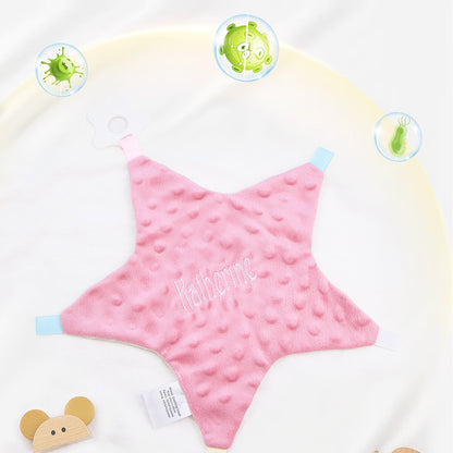 Detail of soft cotton texture on a personalised star comforter, breathable fabric gentle on delicate baby skin