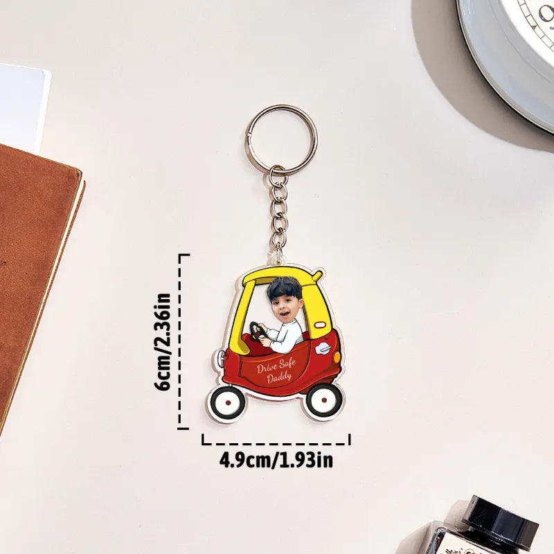 Detail shot of personalised acrylic keyring showing metal split ring and engraved 'Drive Safe' message — durable gifts for men