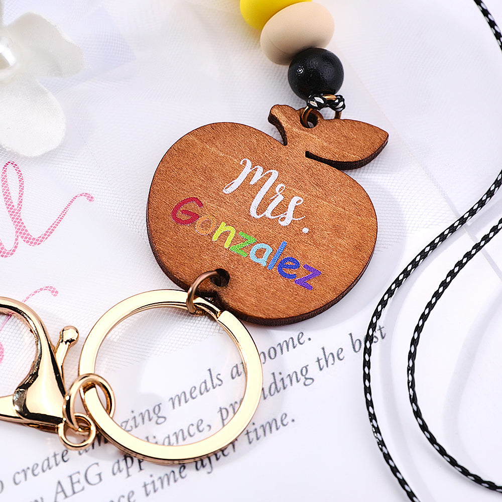 Detail of silicone bead styling and metal clasp on personalised lanyard — durable everyday ID badge holder for school staff